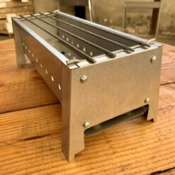 Spiedini Saté-bbq Bali 40 Mini - Kleine, Smalle Houtskoolbarbecue Met Horizontaal Rooster Voor Sate Of Andere Spiesjes - 40 Cm Lang, 11 Cm Breed, 14 Cm Hoog - Ideaal Voor Tuin- Of Open Haard, Of Balkon - Materiaal: Gealuminiseerd Ijzer -Barbecue Benodigdheden 1200x1200 1780