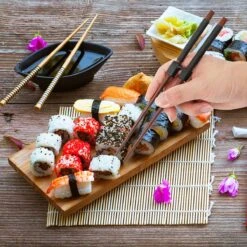 Merkloos 5 Stuks Handige Eetstokjes Houder - Sushi Servies - Herbruikbare Stokjes - Duurzaam - Chopstick Trainers Hulpstuk - Zwart Chopsticks Helper Kinderen -Barbecue Benodigdheden 1200x1200 2312